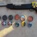 Percheziții într-un dosar privind deținerea ilegală de arme. Polițiștii au găsit arme și sute de proiectile